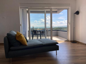 Daniela Family Apartment - top floor - new & quite location - great sea & island view